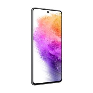 Samsung Galaxy A73 5G at an angle, silver frame, centre punch-hole camera and pink brushstroke wallpaper